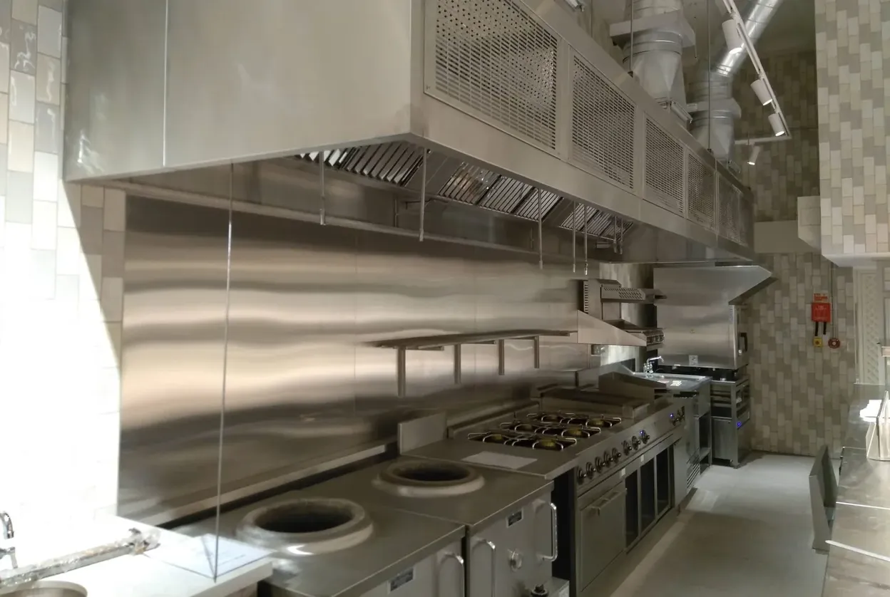 Commercial kitchen extract canopy line in stainless steel